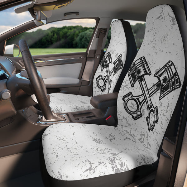 car seat cover features a two piston cross over