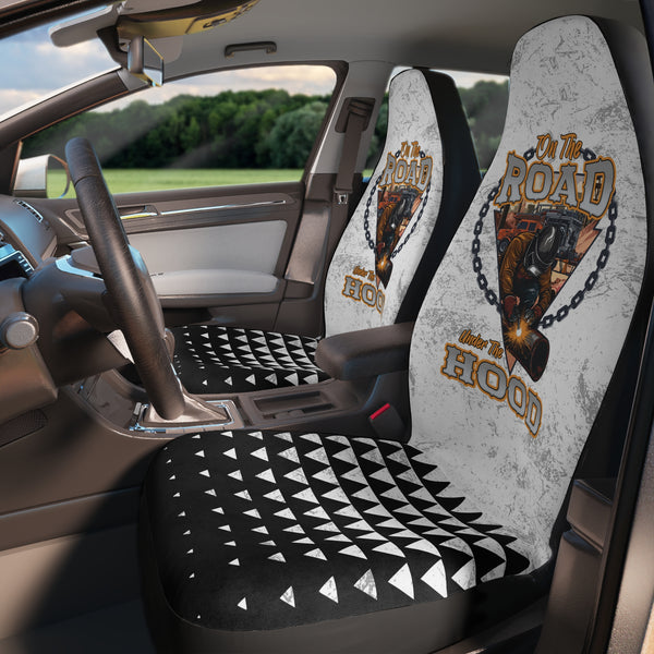 white and black car seat cover features a pipeliner design with bold text on the road under the hood.